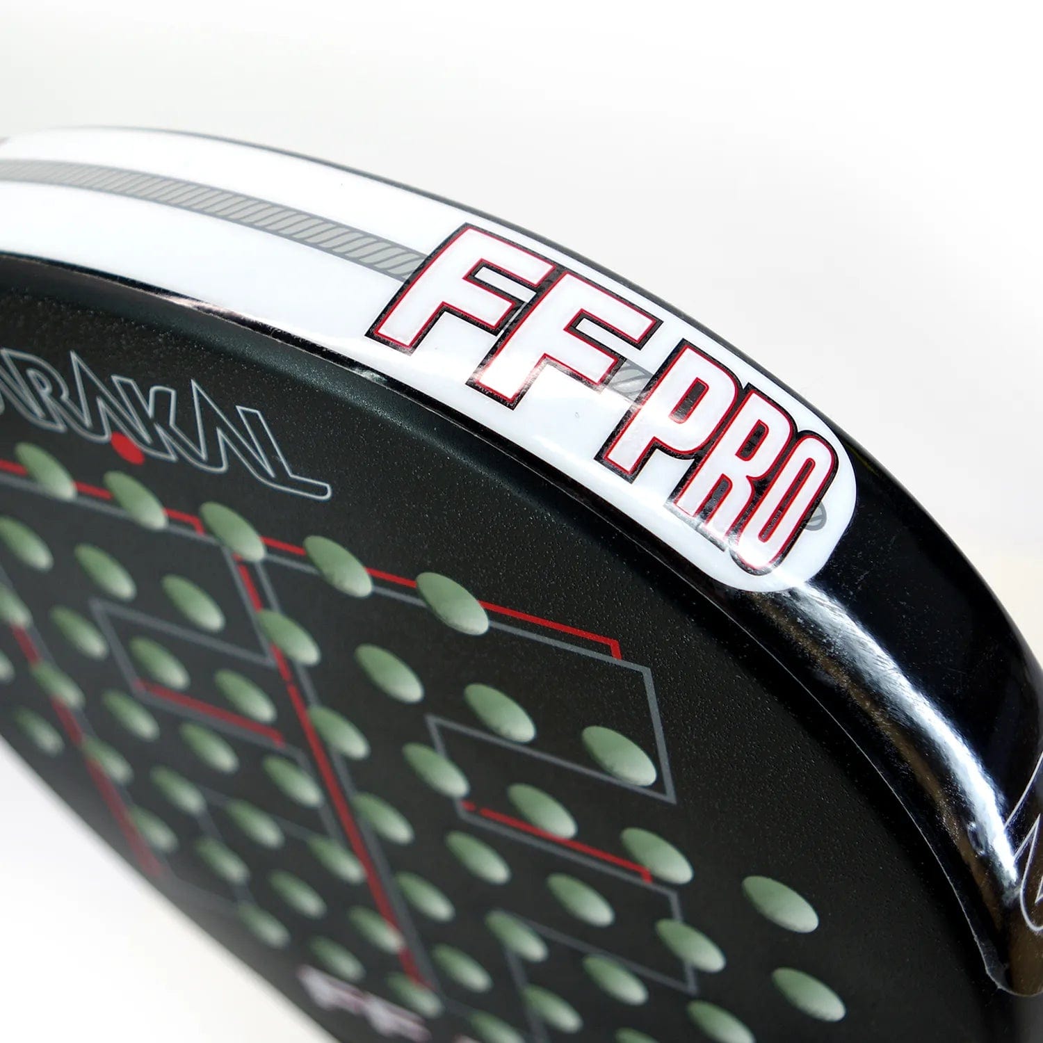 Close-up of the Karakal FF Pro 375 Padel Racket, showing "FF PRO" in bold white and red. Designed for advanced players by Karakal, it has multiple circular holes and a geometric pattern on the surface to boost spin shots.