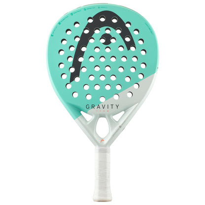 The HEAD Gravity Team 2024 Padel Racket in teal and white features Auxetic 2.0 technology, a bold black logo, round holes, and "GRAVITY" text above the handle—perfect for intermediate padel players.