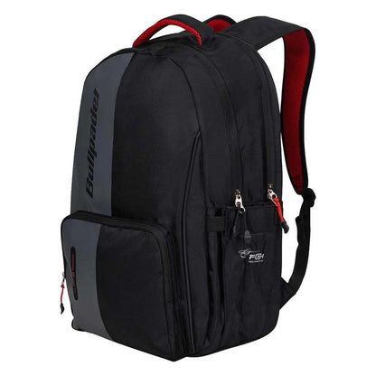 The Bullpadel BPM26020 Neuron Padel Backpack in black features gray accents, red interior lining, multiple zippered compartments, padded shoulder straps, and prominent Bullpadel logos—perfect for padel enthusiasts.
