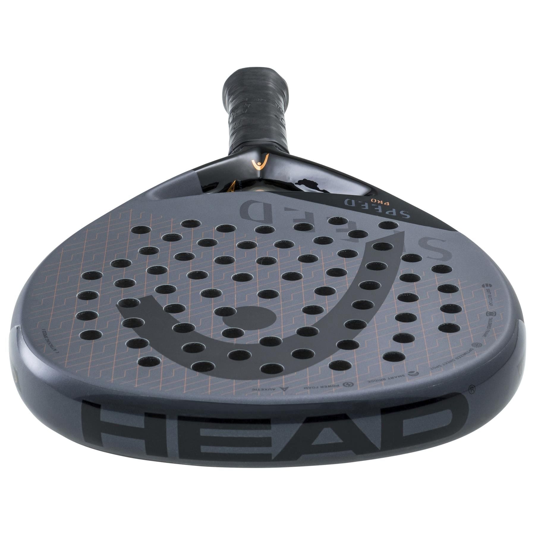 A close-up of the HEAD Speed Pro 2023 Padel Racket by HEAD highlights its orange accents, perforated surface, and textured grip handle for power and control, displayed from the front of the racket head.