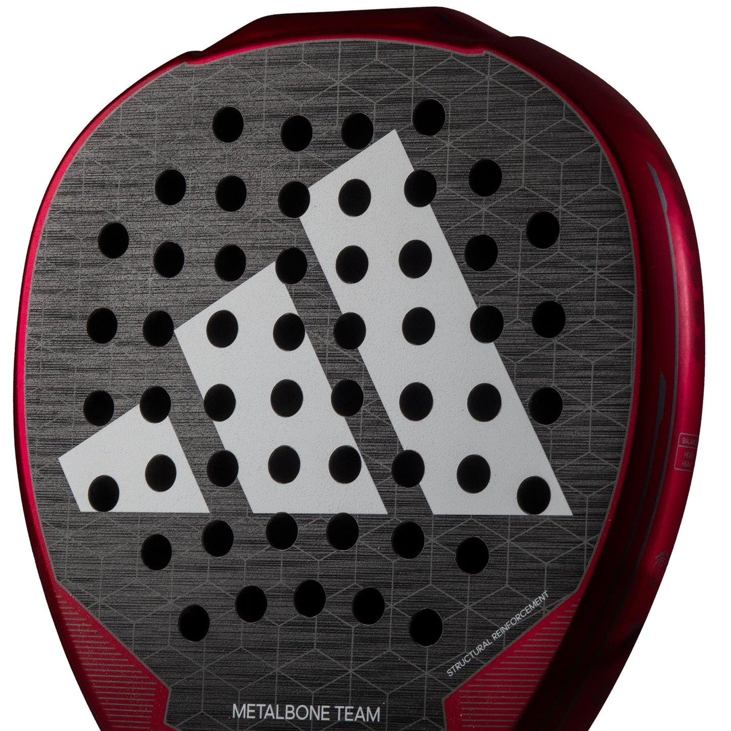 Close-up of the adidas Metalbone Team 3.3 padel racket in black, featuring a bold white geometric logo, circular holes, "Metalbone Team" text on the base, and advanced Spin Blade Grit technology for enhanced control.