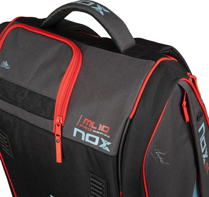 Close-up of the NOX ML10 Team Padel Racket Bag in Black/Clay, featuring "NOX" and "ML10 PRO CUP" branding, red zippers, padded handle, and front mesh detailing.