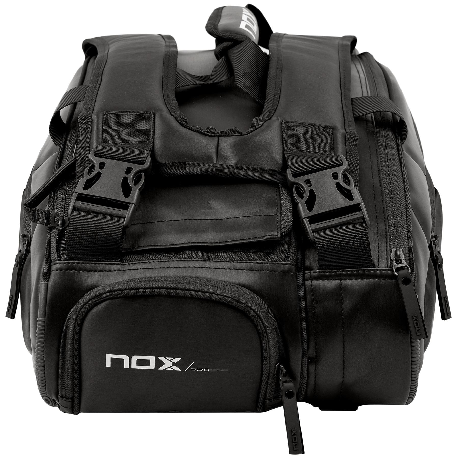 The NOX Pro Series Padel Racket Bag - Black features padded straps, an ergonomic handle, multiple zippers, side pockets, and the iconic NOX logo on the front pocket. It’s sturdy and ideal for carrying sports or travel gear.