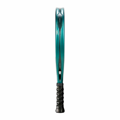 The Bullpadel Hack 04 2025 Padel Racket by Bullpadel is shown vertically from the handle, highlighting its teal frame, visible edges, strings facing inwards, and a black handle with a textured grip for dynamic power.