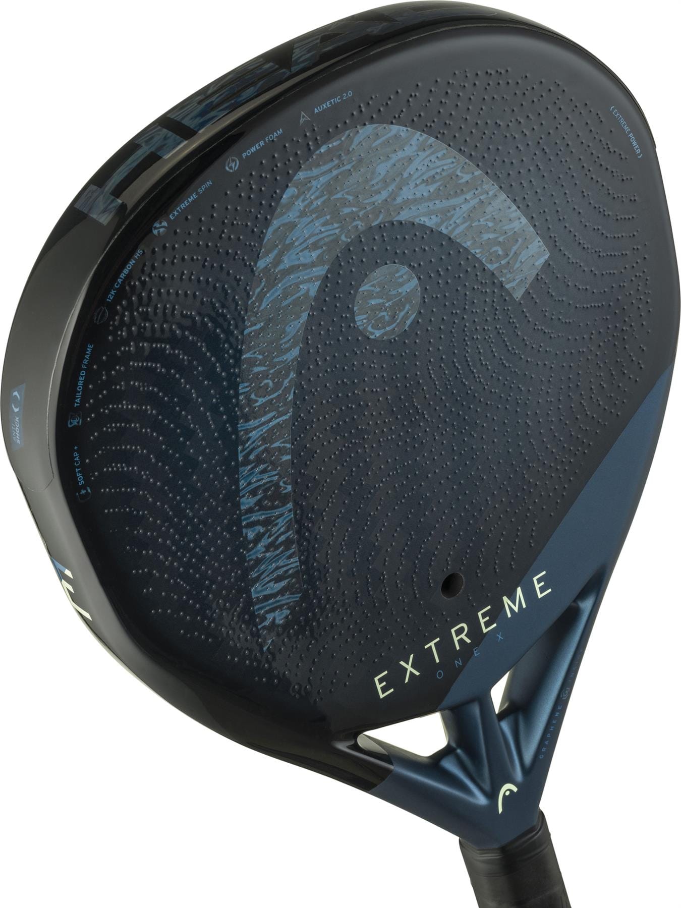 A close-up of the HEAD Extreme One X 2025 Padel Racket highlights its dark blue and black design, bold "EXTREME" branding, a striking HEAD logo, and a textured 12K Carbon Fibre surface perforated with small holes.