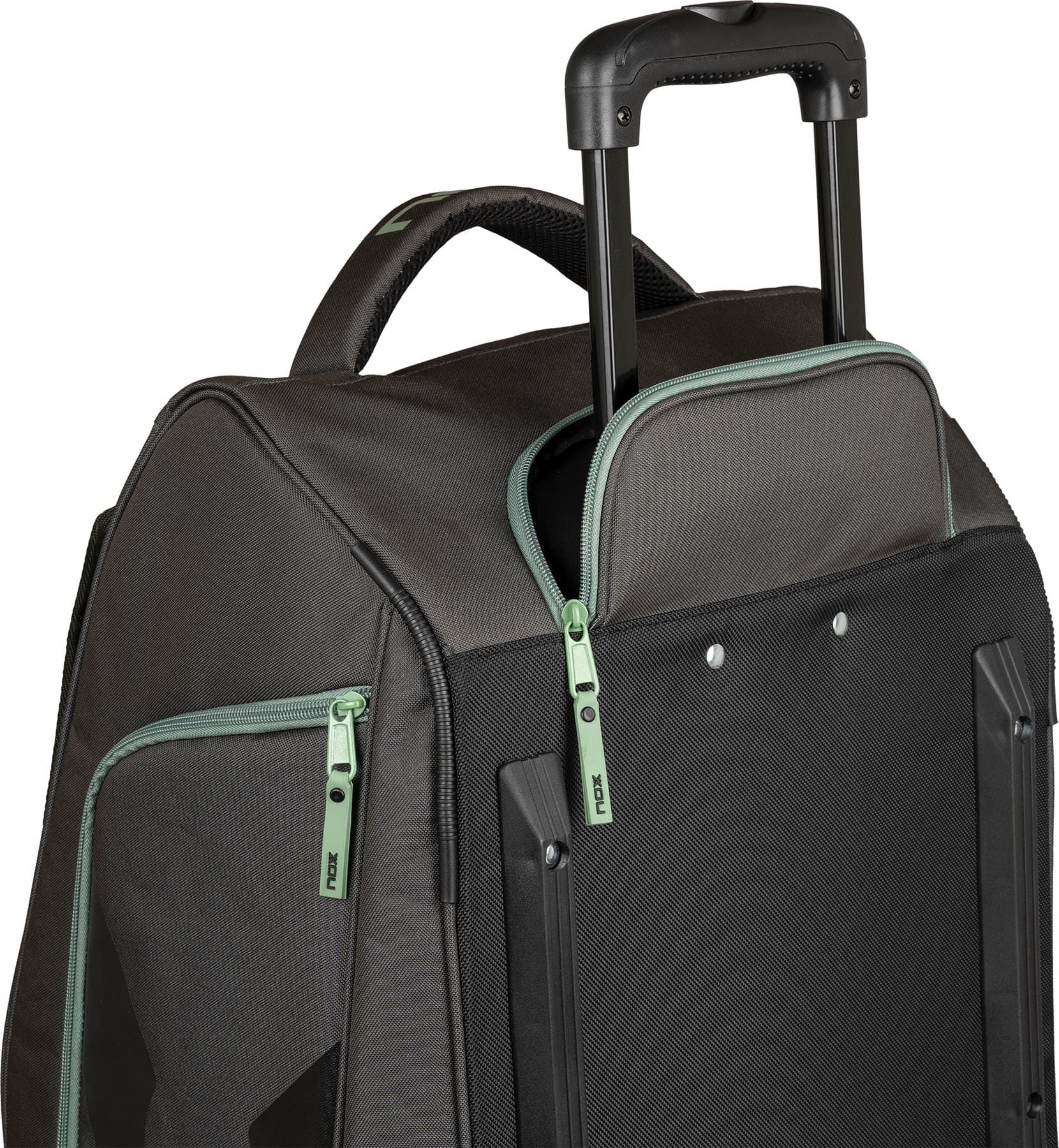 The NOX AT10 Competition Trolley Padel Racket Bag by NOX in black/green features wheels, green zippers, an extended telescopic handle, a fabric top handle, multiple zippered compartments, and reinforced corners.