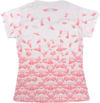 The Yonex YTL2025B Womens Padel T-Shirt in white features a pink geometric pattern that intensifies from top to bottom and is made from breathable sports fabric for comfort and style.