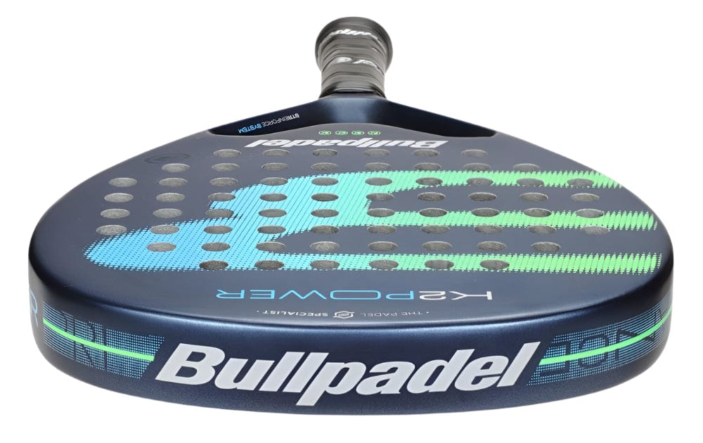 The Bullpadel K2 Power 2025 Padel Racket features a striking blue and green design with the Bullpadel logo and is ideal for players seeking power and control on the court.