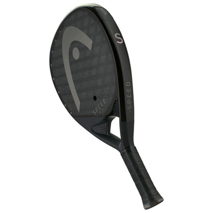 The HEAD Speed One X 2025 Padel Racket features a black design with a textured surface, Auxetic 2.0 technology, the HEAD logo and "SPEED" on the face and edge, and a handle wrapped in black grip tape.