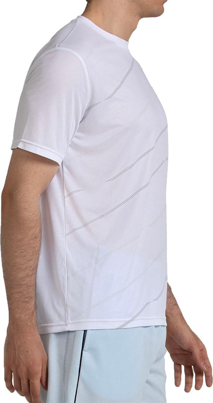 A man in a white Bullpadel Casinas Men's Padel T-Shirt by Bullpadel and light shorts stands sideways against a plain background.