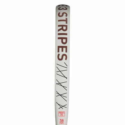 A close-up of the ADIDAS Drive 3.3 Vintage Padel Racket by adidas, featuring bold "3 STRIPES" lettering in brown, tally marks beneath it, and "38 mm" in red at the base—recalling adidas's signature sleek style.