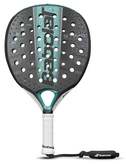 The Babolat Stima Energy Padel Racket is a lightweight model featuring a black, turquoise, and white design with perforated holes, a white padded grip, and a black wrist strap attached to the handle.