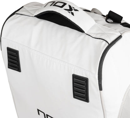 Close-up of the top section of the NOX ML10 Team Padel Racket Bag - White / Grey by NOX, featuring black zippers, a white handle with black trim, and side ventilation panels—perfect as your go-to padel bag.
