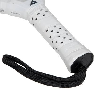 Close-up of the adidas Metalbone Team Light 3.4 Padel Racket handle featuring black ventilation holes and a wrist strap, ideal for advanced players, shown against a plain background.