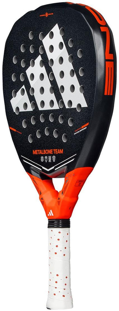 The adidas Metalbone Team 2026 Padel Racket features a black and red design with a white grip, large adidas logo, “Metalbone Team” on the face, and Spin Blade Gritt technology for enhanced control.