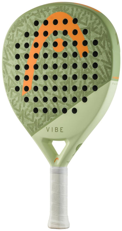 The HEAD Vibe 2026 Green/Orange Padel Racket features a durable fibreglass surface, multiple round holes, a large orange logo, “VIBE” printed near the handle, and a white grip.