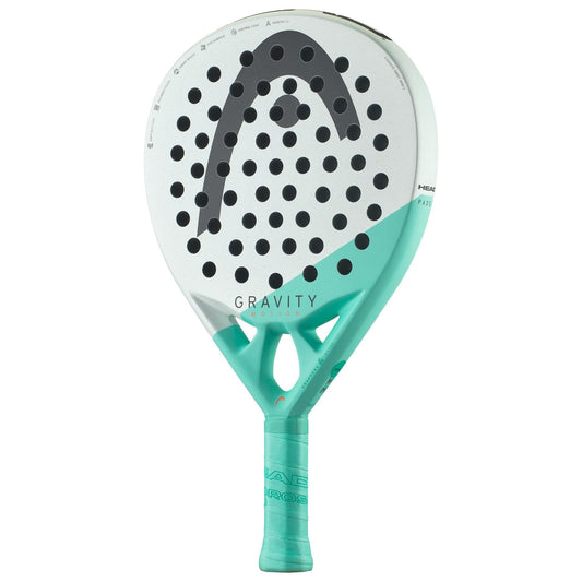 The HEAD Gravity Motion 2024 Padel Racket features a teardrop shape, white and mint green design, large black logo, Spin Surface, circular holes, Auxetic 2.0 technology, and "GRAVITY" printed at the center.