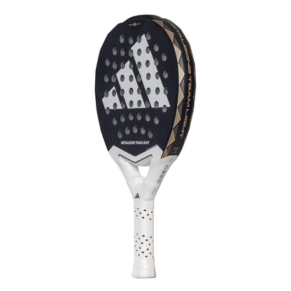 The adidas Metalbone Team Light 3.4 Padel Racket features a black and gold design, white grip, perforated face, and prominent adidas logo—perfect for advanced players seeking a lightweight racket with style and performance.