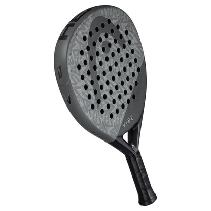 The HEAD Vibe 2025 Grey / Black Padel Racket by HEAD features a teardrop shape, patterned face with multiple perforations, and "VIBE" near the handle, displayed against a white background.