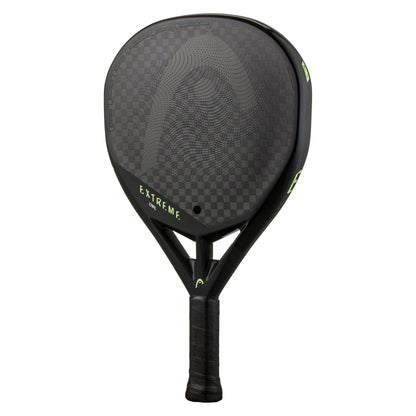 The HEAD Extreme One 2023 Padel Racket by HEAD is lightweight with a black checkered 12K carbon surface, green "EXTREME" on the face, and a black handle featuring a subtle green logo near the throat.
