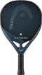 The HEAD Extreme One X 2025 Padel Racket by HEAD features a black and dark blue design, round perforated 12K Carbon Fibre surface, "EXTREME" in white near the handle, Power Foam core, and black grip tape for control.
