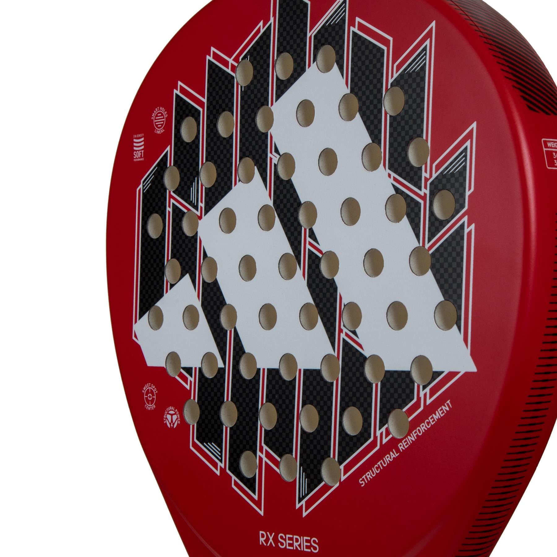 Close-up of the adidas ADIDAS RX Series Red Padel Racket, showing a bold geometric pattern in white, black, and red, with circular holes and "RX SERIES" plus "STRUCTURAL REINFORCEMENT" text on the beginner racket’s surface.