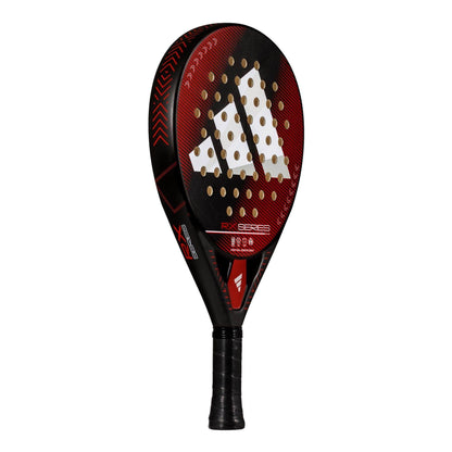 The adidas RX Series Red 3.4 Padel Racket features a bold black and red design with a large white adidas logo, round holes on the head, and a textured handle—ideal for intermediate players who want both performance and style.