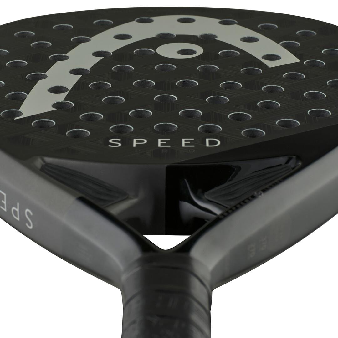 Close-up of the HEAD Speed Pro 2025 Padel Racket showing "SPEED" on its surface, round holes, a curved white detail, and a partially visible handle. Enhanced with Power Foam and Auxetic 2.0 technology for superior performance.