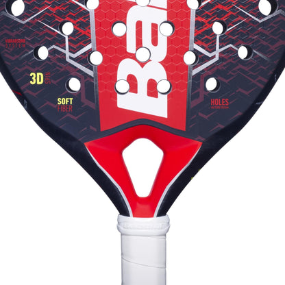 Close-up of the Babolat Technical Vertuo 2.5 Padel Racket, featuring a bold geometric pattern, round holes, and partial branding. Made for technical strikers, its handle sports a white grip tape.