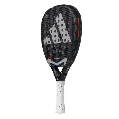 The adidas Metalbone 3.4 Padel Racket features a black design with a large grey logo, round holes on the face, and a white handle with red dots—an advanced racket built for powerful play.