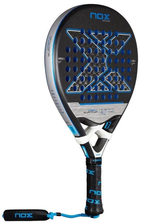 The NOX Luxury Quantum 12K Cobalt 2025 Padel Racket by NOX comes in black, blue, and silver with a textured 12K carbon fiber surface, multiple holes, and a cushioned grip with a practical wrist strap at the base.