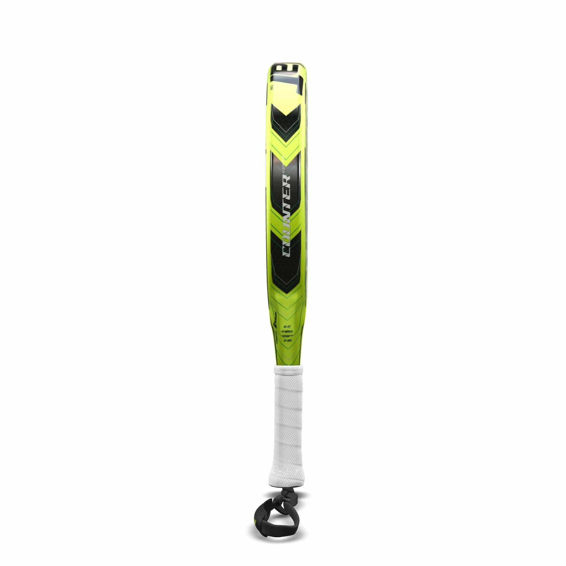 The Babolat Counter Vertuo Padel Racket, in green and black with a white grip and black wrist strap, stands upright against a white background. Designed by Babolat for easy power on the court.