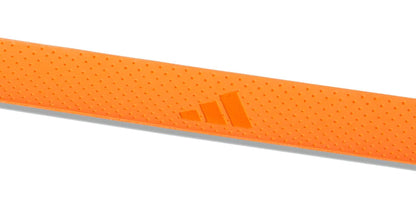 Close-up of an orange ADIDAS Padel Overgrips (3 Pack) by adidas, featuring a textured, micro-perforated surface and embossed adidas logo for enhanced comfort and performance.