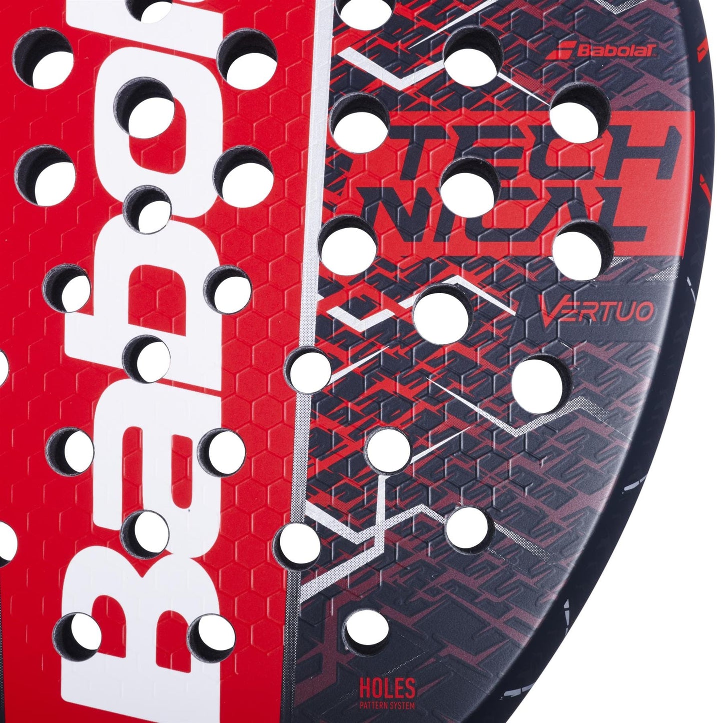 Close-up of the Babolat Technical Vertuo 2.5 padel racket in red and black, featuring hexagonal patterns, circular holes, and "Technical Vertuo" and "Holes Pattern System"—ideal for technical players seeking precision.