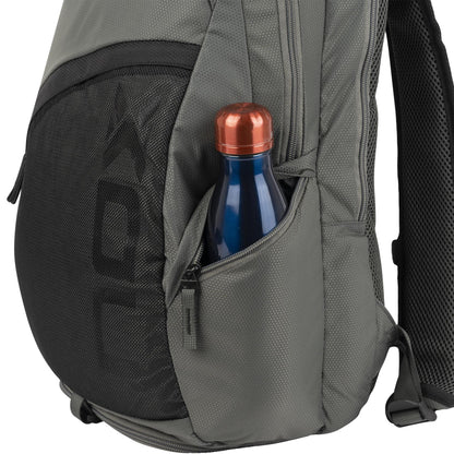 A close-up of the NOX Street Series Padel Backpack - Grey by NOX shows ergonomic padded straps, a mesh pocket holding a blue water bottle with a metallic copper cap, and detailed fabric and zipper features.