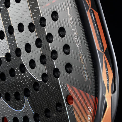 Close-up of the Bullpadel Neuron 02 Edge 2026 Padel Racket surface, highlighting its textured patterns, round perforations, and visible Bullpadel branding with "NEURON" and "POWER" near the edge.