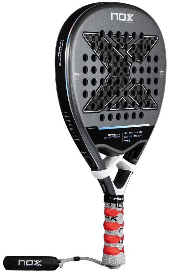The NOX Luxury Quantum 12K Carbon 2025 Padel Racket by NOX features a black and silver design with a large X pattern, multiple round holes, 12K carbon fibre build, and a handle wrapped in red and white grip tape.