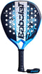 The Babolat Air Vertuo 2.6 Padel Racket features a black, blue, and white design with a perforated face, black grip, and blue wrist strap with the Babolat logo for optimal control and comfort on the court.