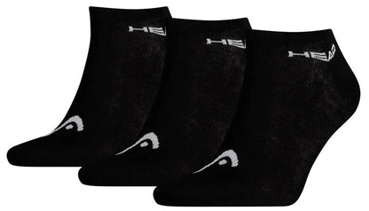 A row of three black HEAD Sneaker Padel Socks showcases white branding on the cuff and a geometric toe pattern, highlighting their comfort-focused design against a white background.