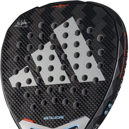 Close-up of the black adidas Metalbone 3.4 Padel Racket featuring a textured surface, large silver adidas logo, round holes, and "METALBONE" near the bottom—designed for advanced power and precision.