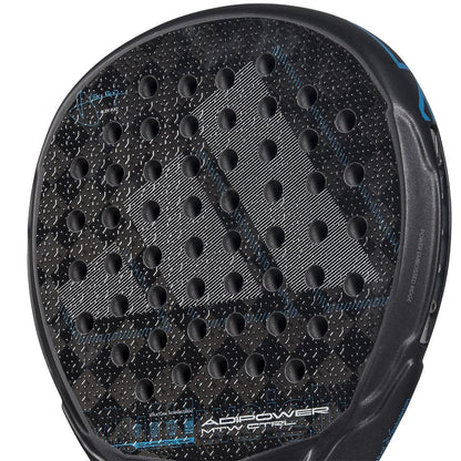 Close-up of the adidas ADIDAS Adipower Multiweight CTRL 3.4 Padel Racket face, showing a circular hole grid, textured carbon fiber pattern, "Adipower" branding, and adjustable weight features near the bottom edge.