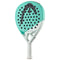 The HEAD Gravity Team 2024 Padel Racket features a teal and white design with black circular holes, "GRAVITY" on the face, Auxetic 2.0 technology, and a white grip—perfect for intermediate players.