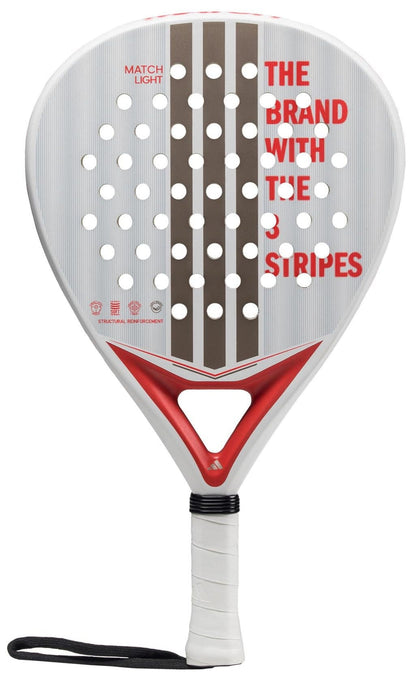 The adidas Match Light 3.4 Padel Racket is white with brown and red accents, three brown stripes, a perforated face, "THE BRAND WITH THE 3 STRIPES" in red, a white grip handle, and a black wrist strap.
