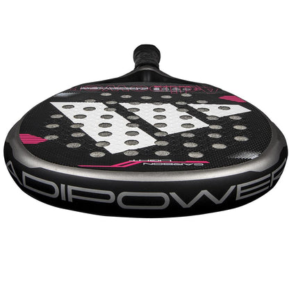 A close-up of the adidas ADIDAS Adipower Carbon Light 3.4 Padel Racket, showcasing its lightweight design, white, pink, and gray accents, adidas logo, "ADIPOWER" branding, and a surface with multiple perforations.