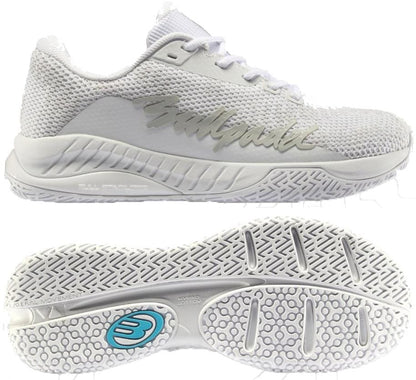 The Bullpadel Ionic W 26V Womens Padel Shoes in white offer a stylish mesh upper with “Bullpadel” in silver on the side and a blue-logo outsole—ideal for women seeking grip and performance on the padel court.