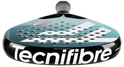 A close-up of the Tecnifibre Curva Team Padel Racket shows its teardrop shape, turquoise and white colors, perforated holes, black handle, and the Tecnifibre brand name displayed on the frame.