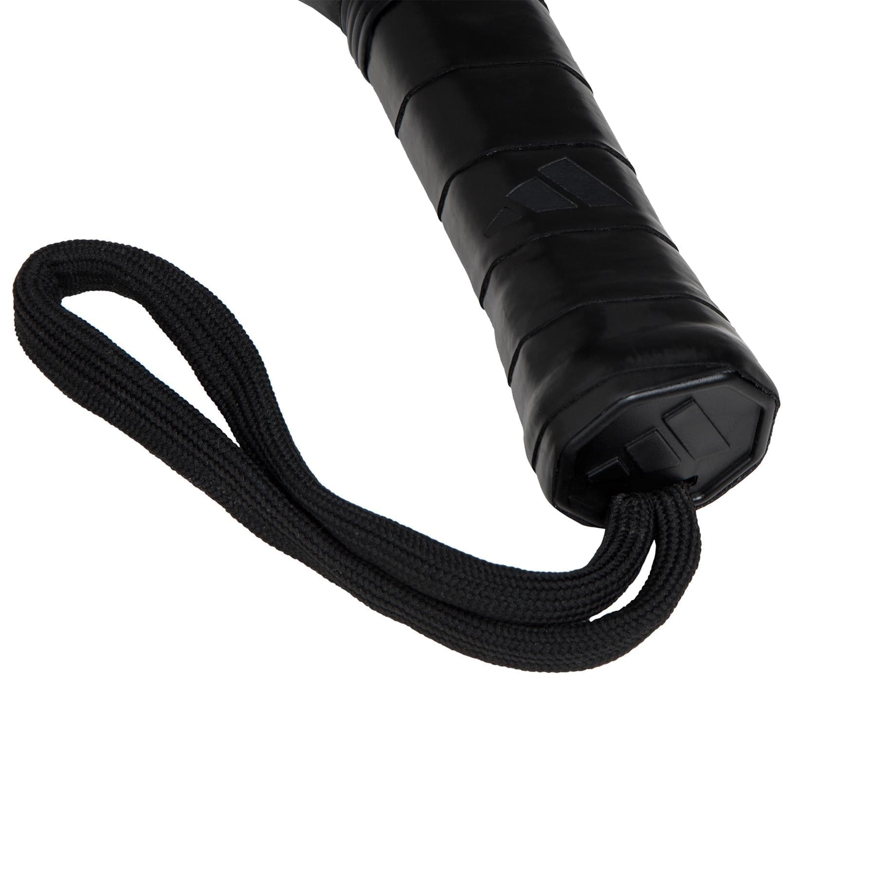 Close-up of the adidas Drive Black 3.4 Padel Racket handle wrapped in grip tape, featuring a black wrist strap and embossed end cap logo—a quality beginner padel racket shown against a white background.