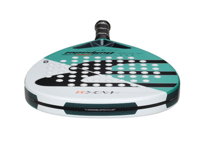 The Bullpadel Hack Junior 25 is a teal, black, and white padel racket with a perforated face design, “HACK 03” branding, a carbon fibre frame, and a black handle with white grip tape.