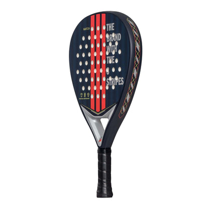 The adidas Match Blue 3.4 Padel Racket features a black design with red stripes, white Smart Holes Lineal perforations, "THE BRAND WITH THE STRIPES" on the face, an AllRound hybrid head shape, and a black grip-wrapped handle.