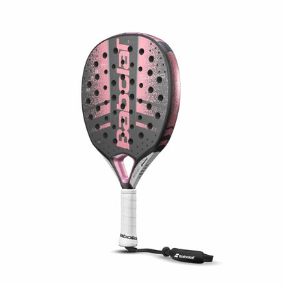 The Babolat Stima Spirit Padel Racket features a pink and black design, white grip, perforated face, and wrist strap—ideal for players seeking a lightweight racket from Babolat.